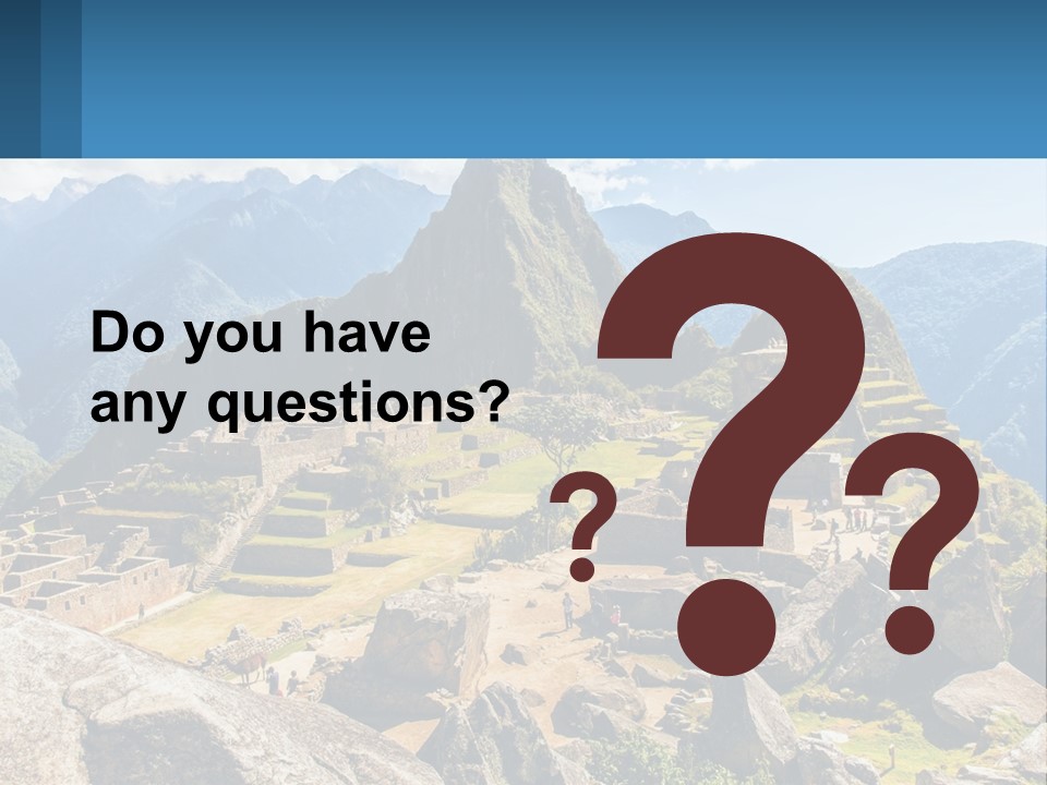 A View Of A Mountain Range With A Few Ruins In The Foreground PowerPoint Template