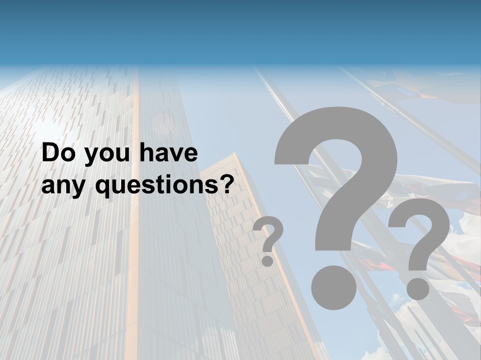 A Group Of Flags Flying In Front Of A Tall Building PowerPoint Template