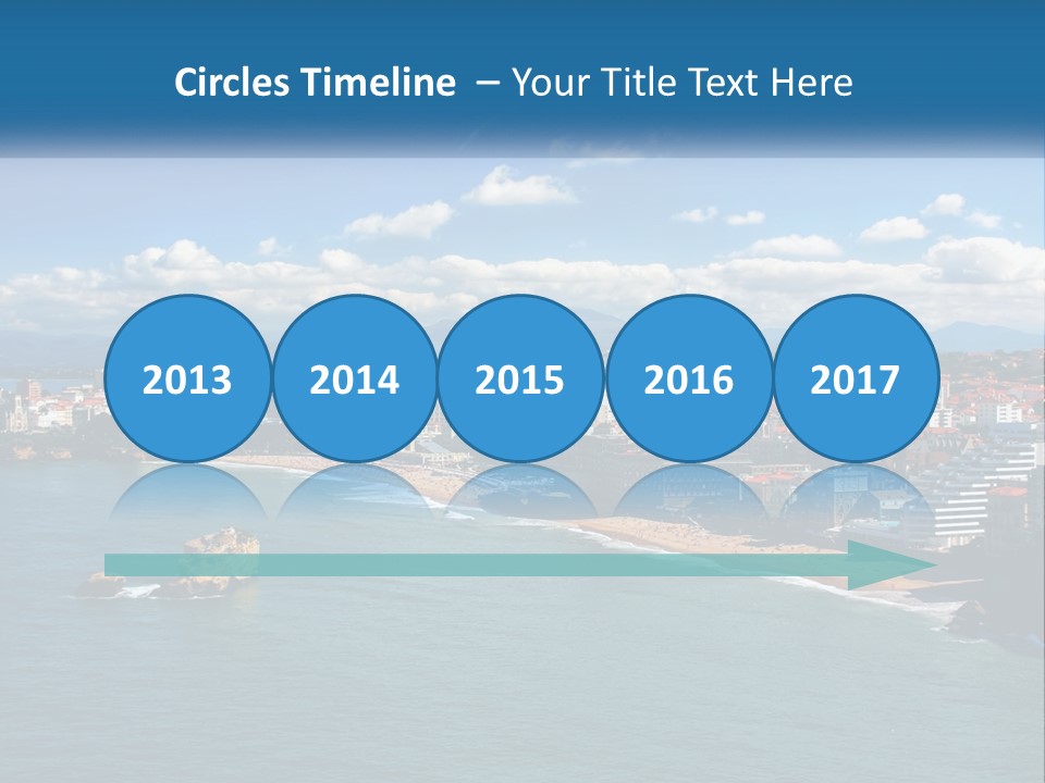 A View Of A Beach With A City In The Background PowerPoint Template