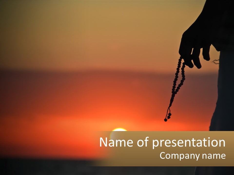 A Person Holding A Rosary With The Sun Setting In The Background PowerPoint Template