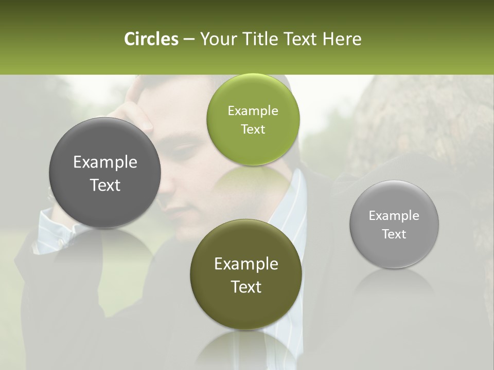 A Man In A Suit Sitting Next To A Tree PowerPoint Template