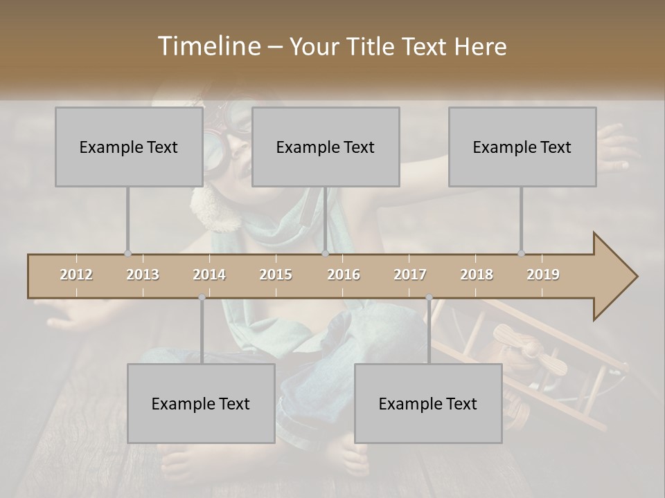 A Young Boy In A Hat And Scarf Sitting On A Wooden Floor PowerPoint Template