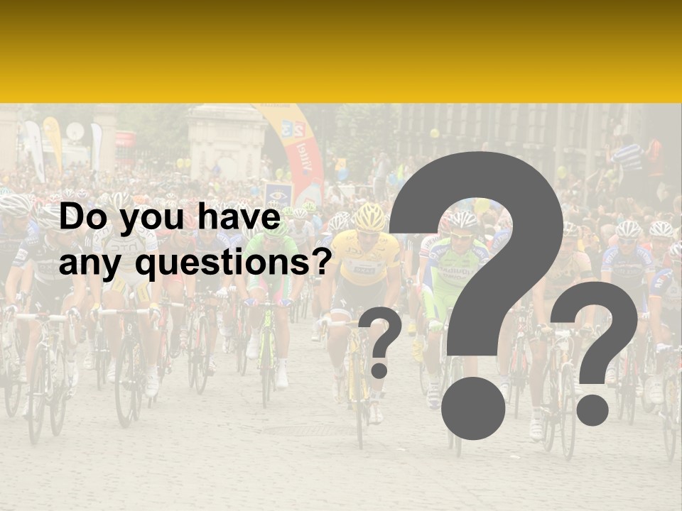 A Group Of People Riding Bikes Down A Street PowerPoint Template