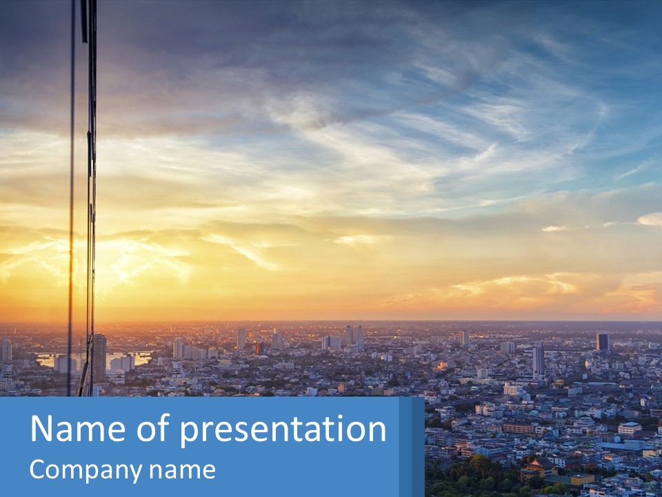 A View Of A City At Sunset From A High Rise PowerPoint Template