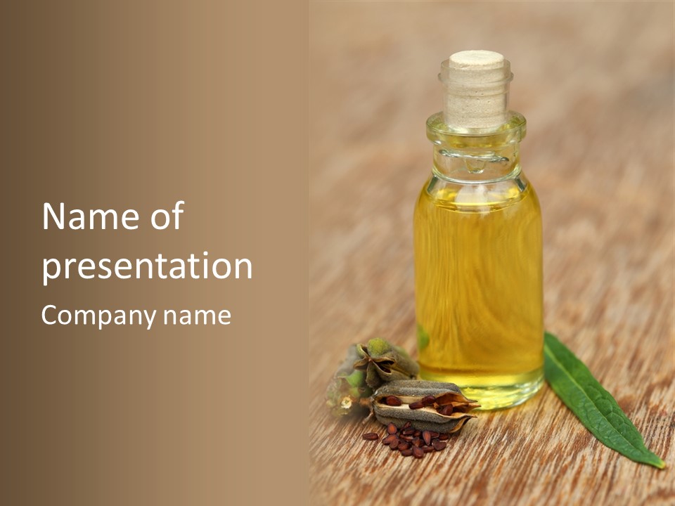 A Bottle Of Oil With A Green Leaf On A Wooden Table PowerPoint Template
