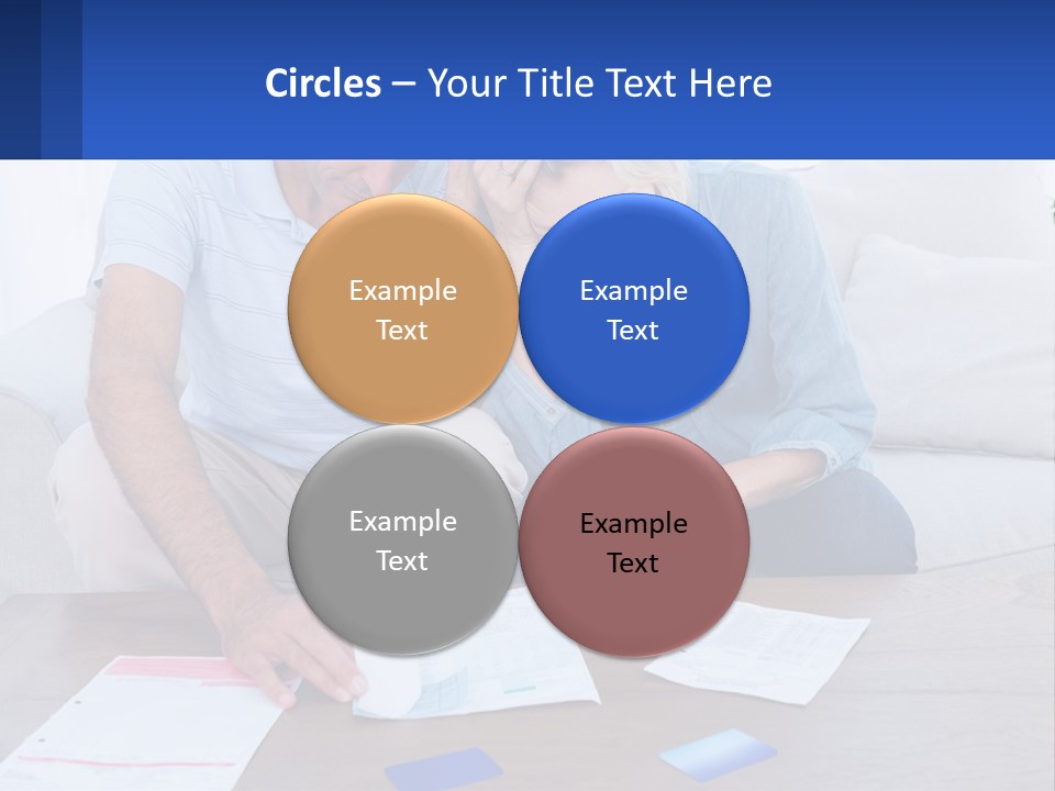 A Man And Woman Sitting On A Couch Looking At A Calculator PowerPoint Template