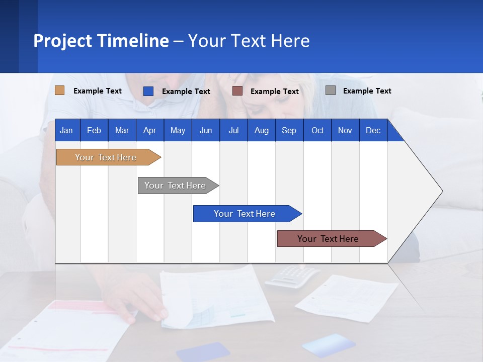 A Man And Woman Sitting On A Couch Looking At A Calculator PowerPoint Template