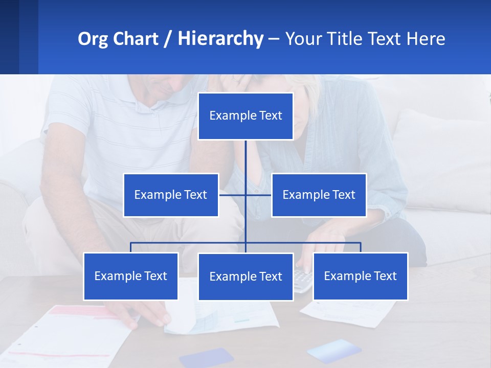 A Man And Woman Sitting On A Couch Looking At A Calculator PowerPoint Template