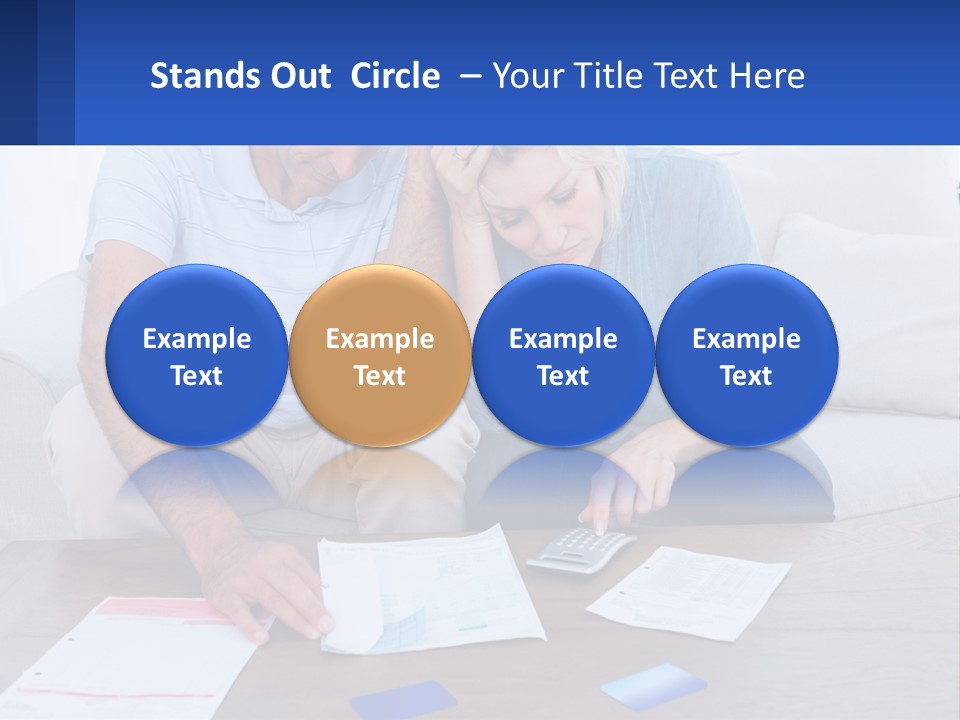 A Man And Woman Sitting On A Couch Looking At A Calculator PowerPoint Template