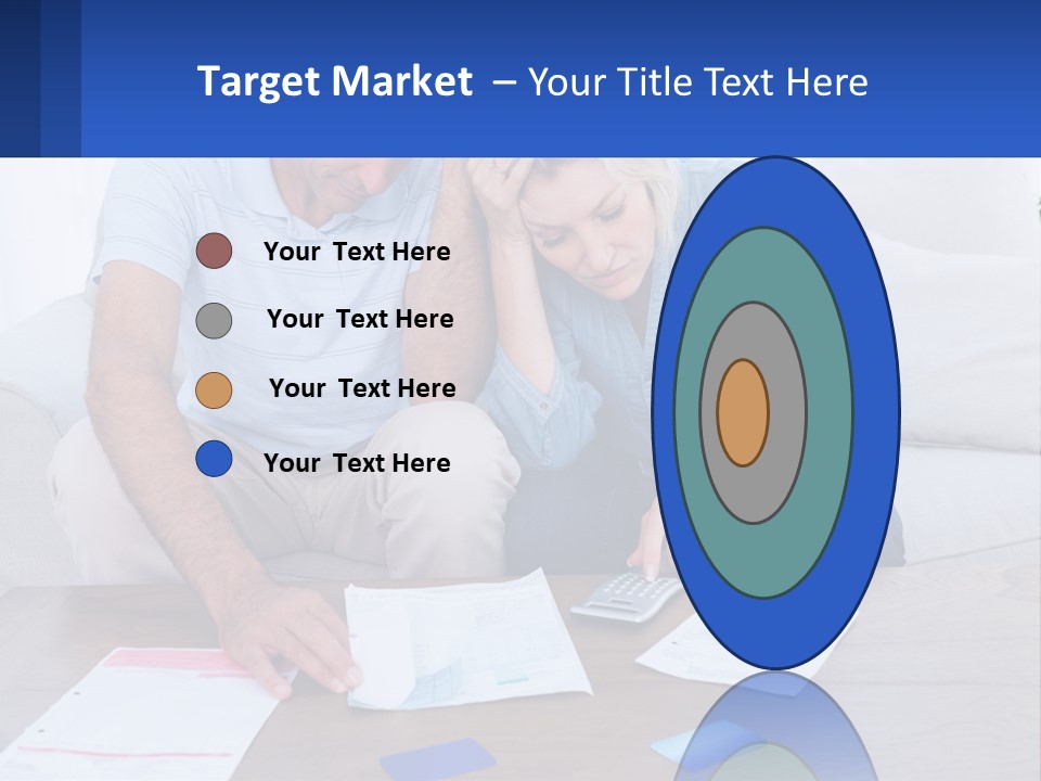 A Man And Woman Sitting On A Couch Looking At A Calculator PowerPoint Template