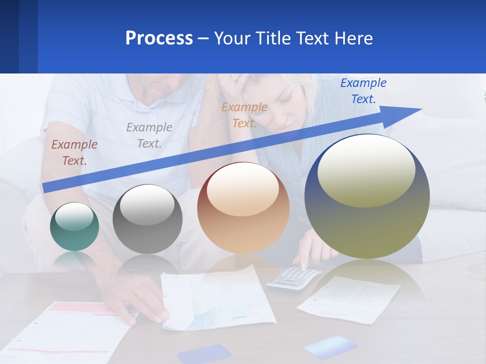 A Man And Woman Sitting On A Couch Looking At A Calculator PowerPoint Template