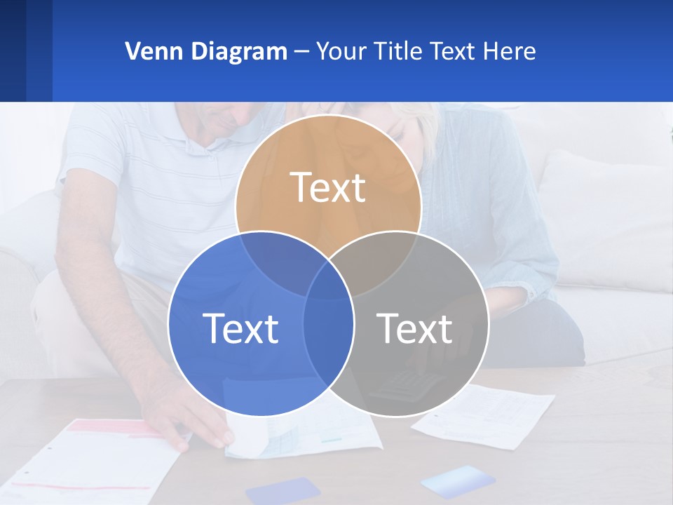 A Man And Woman Sitting On A Couch Looking At A Calculator PowerPoint Template