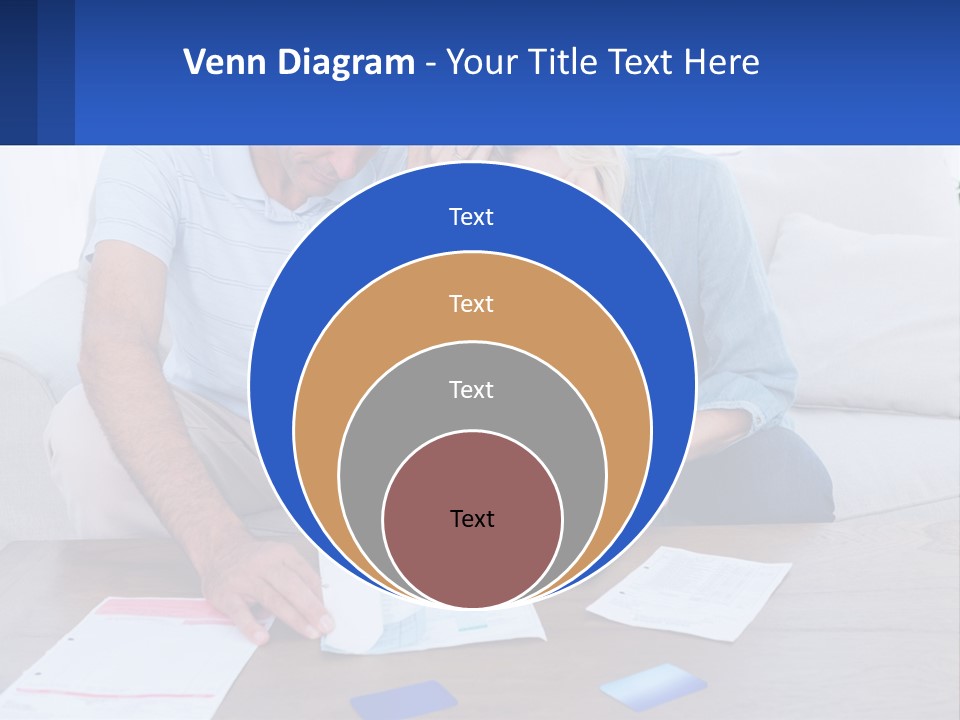 A Man And Woman Sitting On A Couch Looking At A Calculator PowerPoint Template