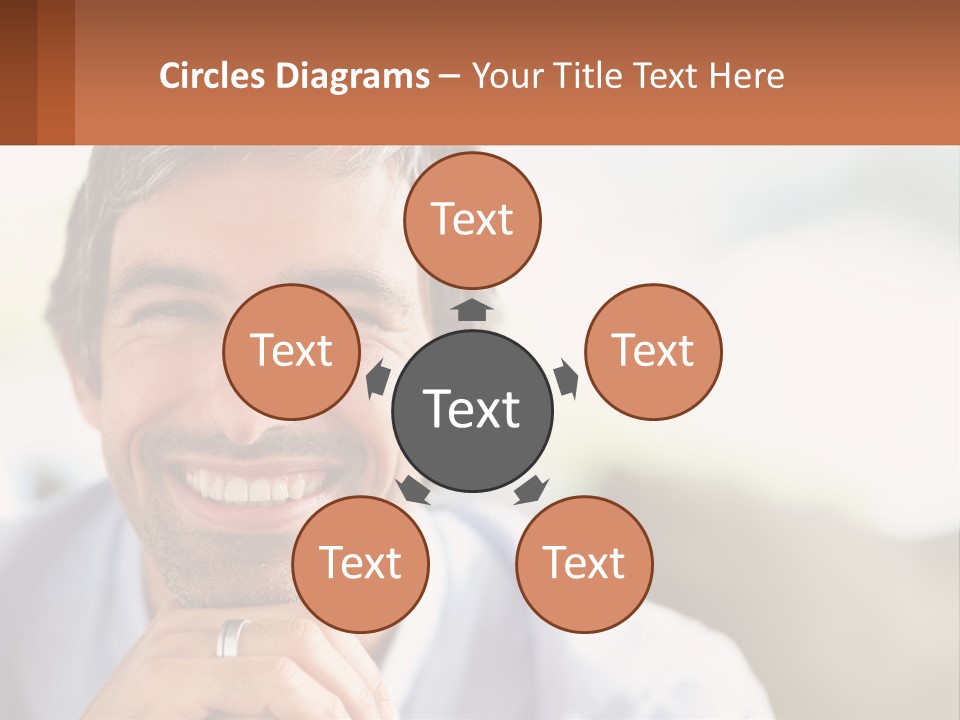 A Man Smiling With A Business Card In Front Of Him PowerPoint Template