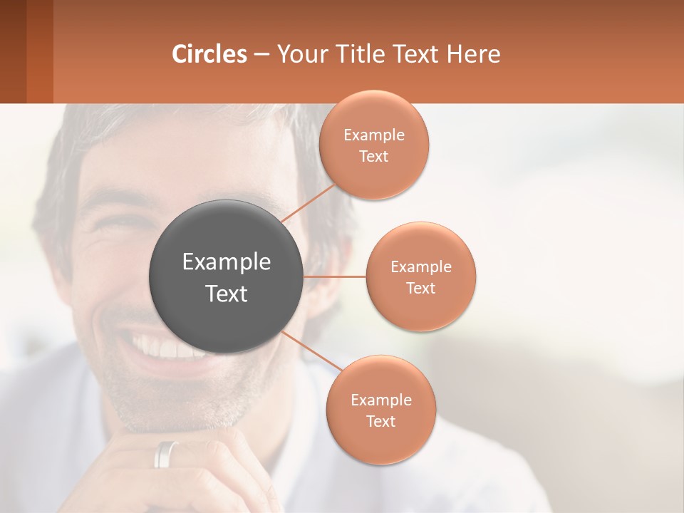 A Man Smiling With A Business Card In Front Of Him PowerPoint Template