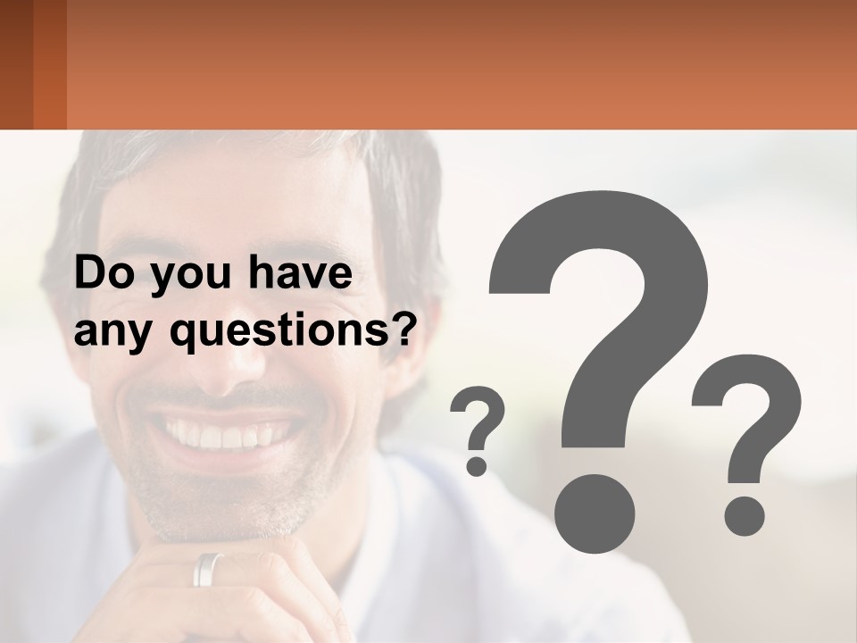 A Man Smiling With A Business Card In Front Of Him PowerPoint Template