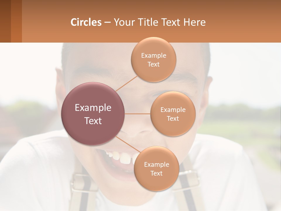 A Young Boy Smiling With His Mouth Open PowerPoint Template