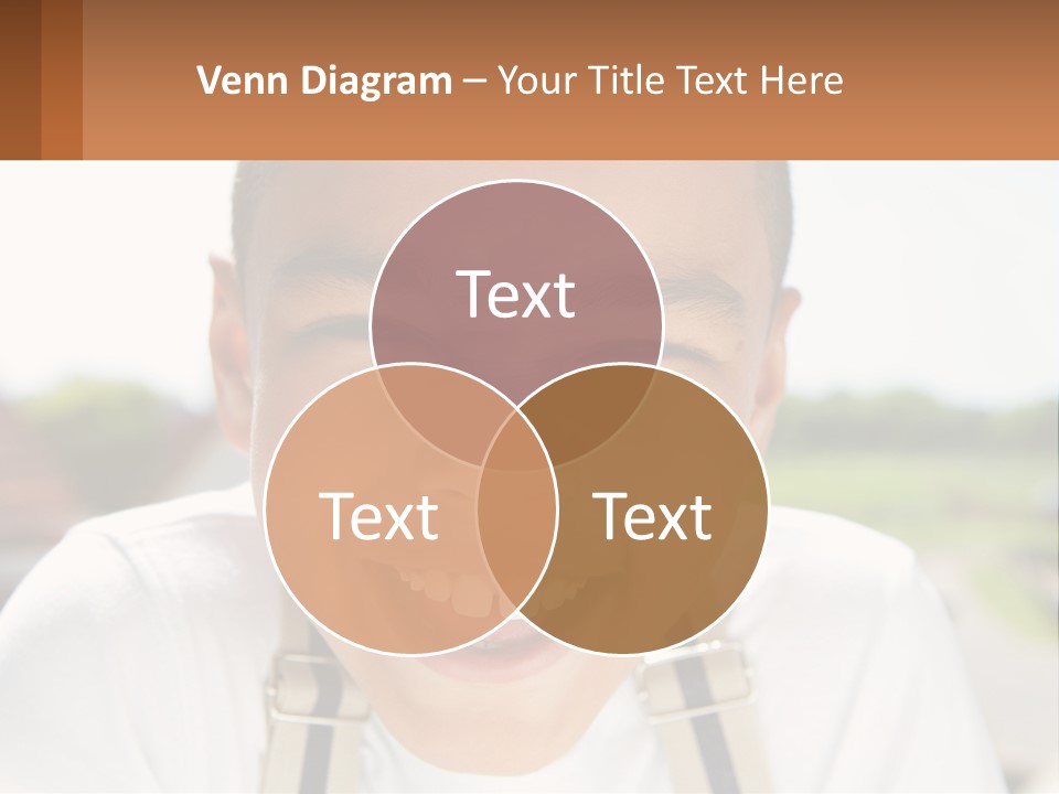 A Young Boy Smiling With His Mouth Open PowerPoint Template