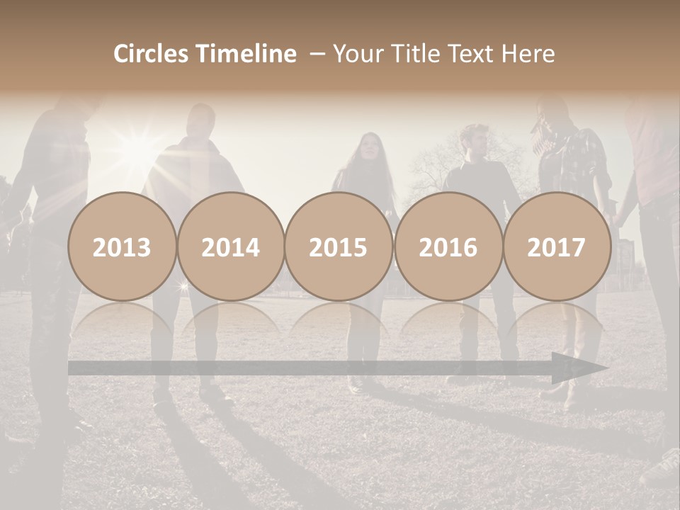 A Group Of People Holding Hands In A Field PowerPoint Template