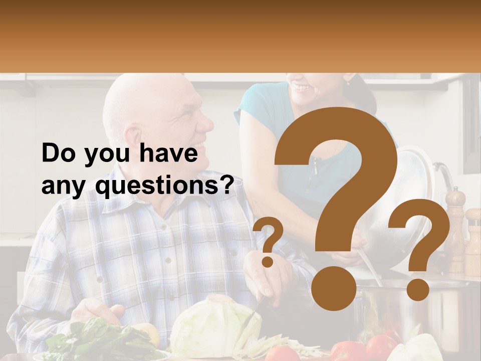 A Man And A Woman Preparing Food In A Kitchen PowerPoint Template