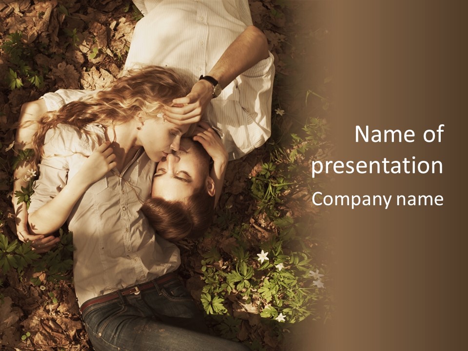 A Man And A Little Girl Laying On The Ground PowerPoint Template