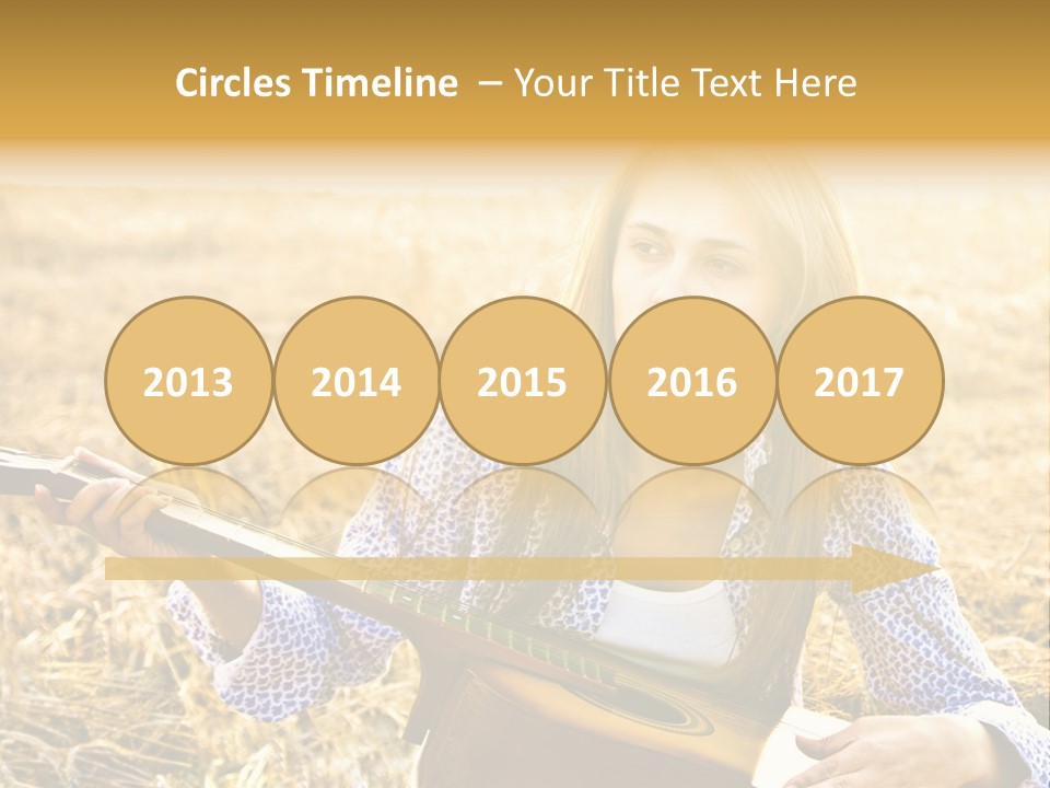 A Woman Sitting In A Field Holding A Guitar PowerPoint Template