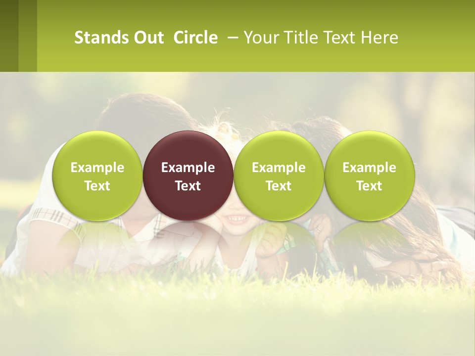 A Family Laying On The Grass In A Park PowerPoint Template
