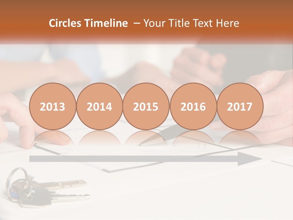 A Group Of People Sitting Around A Table With Keys PowerPoint Template