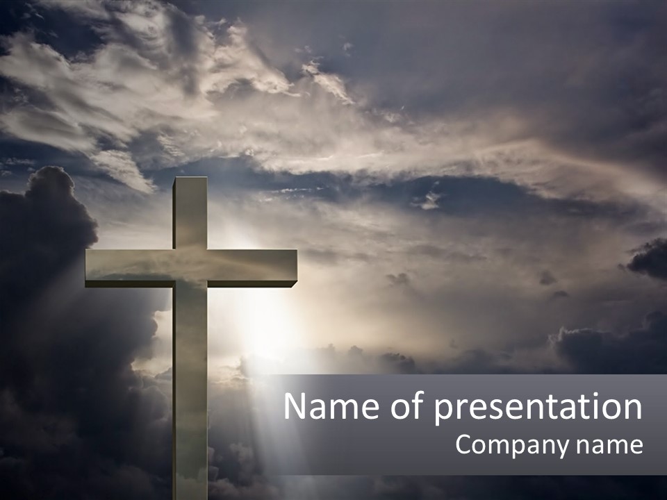 A Cross On A Cloudy Day With The Sun Shining Through The Clouds PowerPoint Template