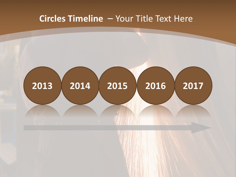 A Man Working On A Piece Of Metal In A Factory PowerPoint Template