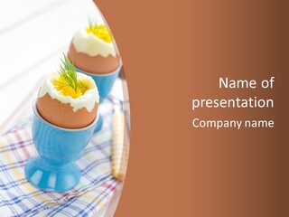 Two Eggs In An Egg Cup On A Table PowerPoint Template