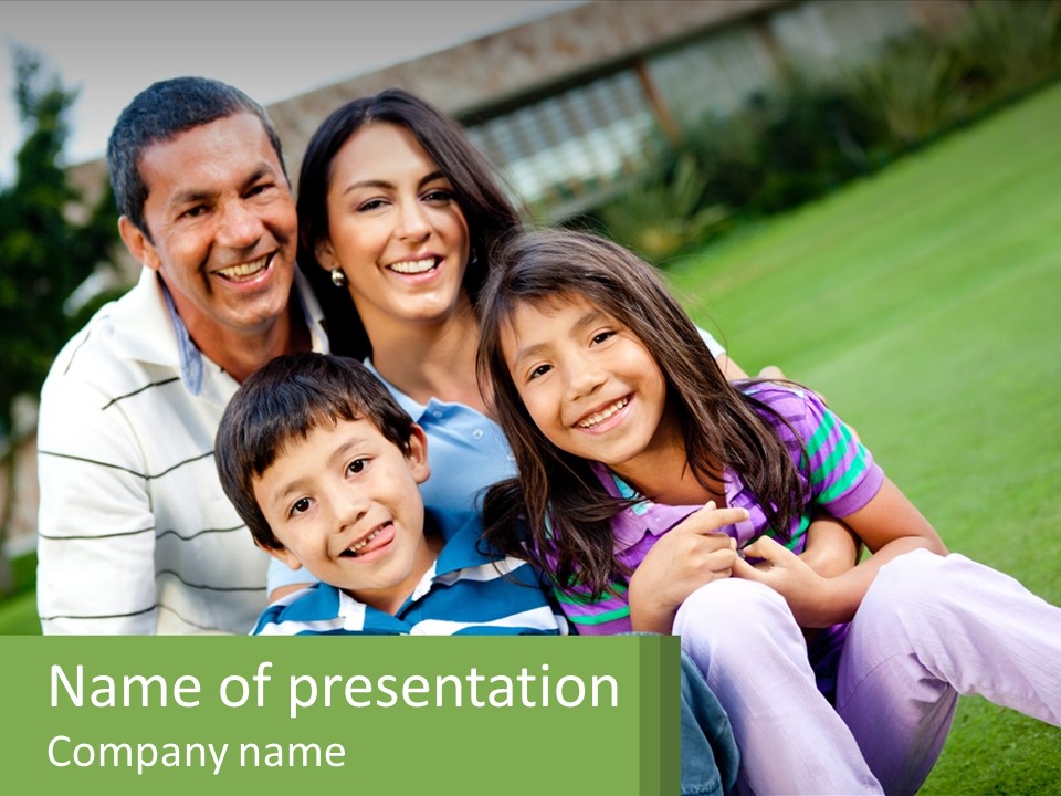 A Family Is Posing For A Picture In The Grass PowerPoint Template