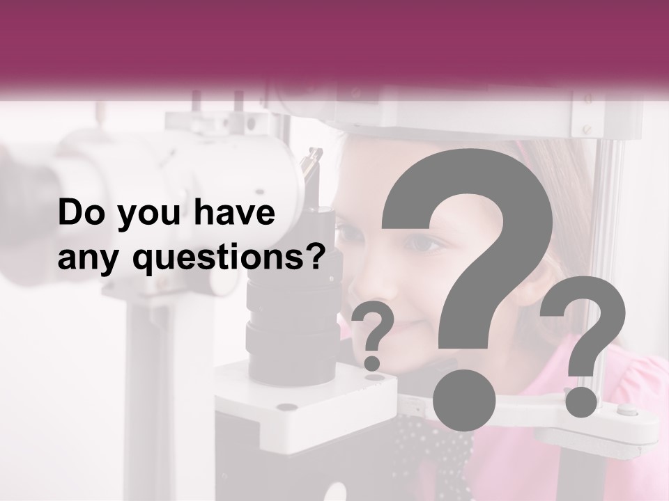 A Little Girl Is Looking Through A Microscope PowerPoint Template