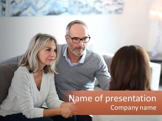 A Man And Woman Sitting On A Couch Talking To Each Other PowerPoint Template
