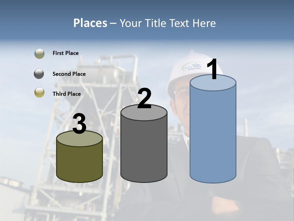 A Man Wearing A Hard Hat Standing In Front Of A Power Plant PowerPoint Template