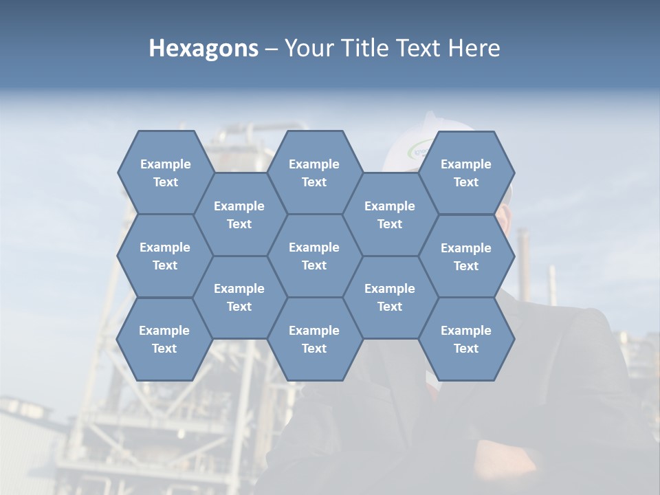 A Man Wearing A Hard Hat Standing In Front Of A Power Plant PowerPoint Template