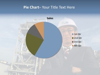 A Man Wearing A Hard Hat Standing In Front Of A Power Plant PowerPoint Template