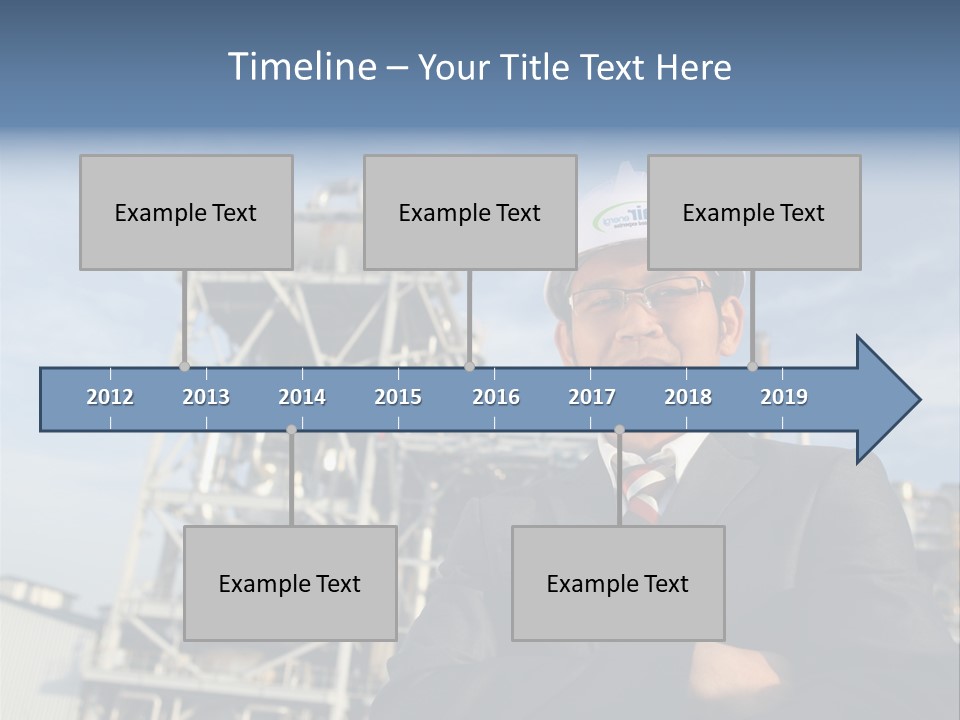 A Man Wearing A Hard Hat Standing In Front Of A Power Plant PowerPoint Template