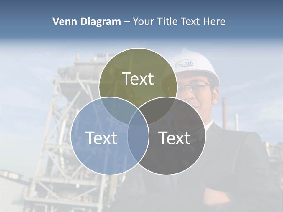 A Man Wearing A Hard Hat Standing In Front Of A Power Plant PowerPoint Template