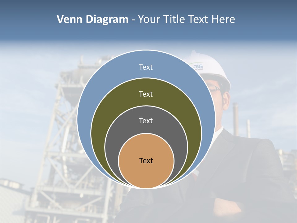 A Man Wearing A Hard Hat Standing In Front Of A Power Plant PowerPoint Template