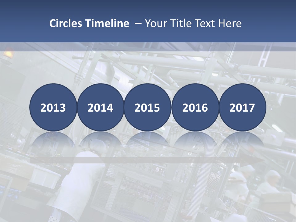 A Factory Filled With Lots Of Machines And Workers PowerPoint Template