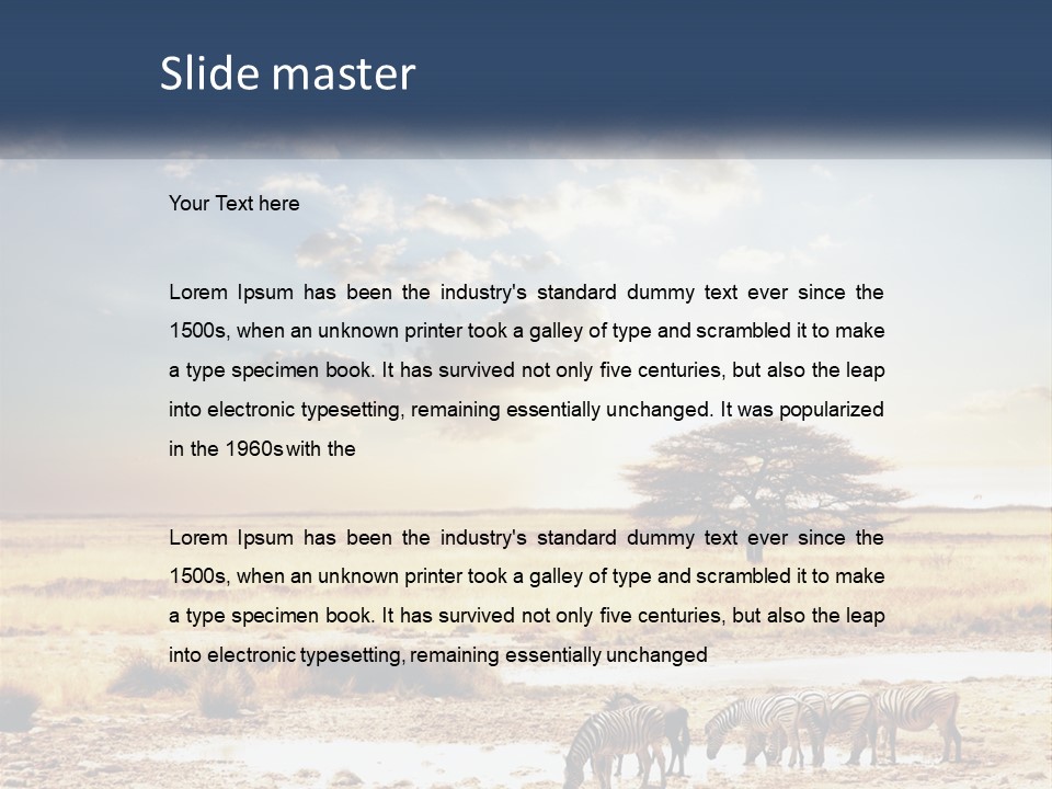 A Group Of Elephants In A Field With A Tree In The Background PowerPoint Template