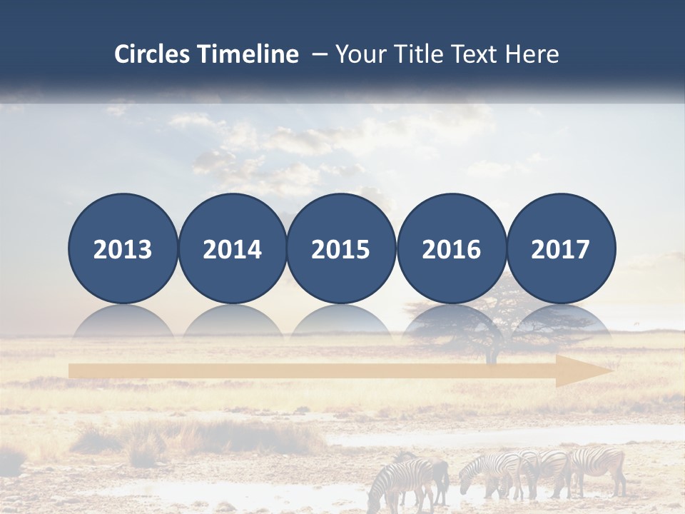 A Group Of Elephants In A Field With A Tree In The Background PowerPoint Template