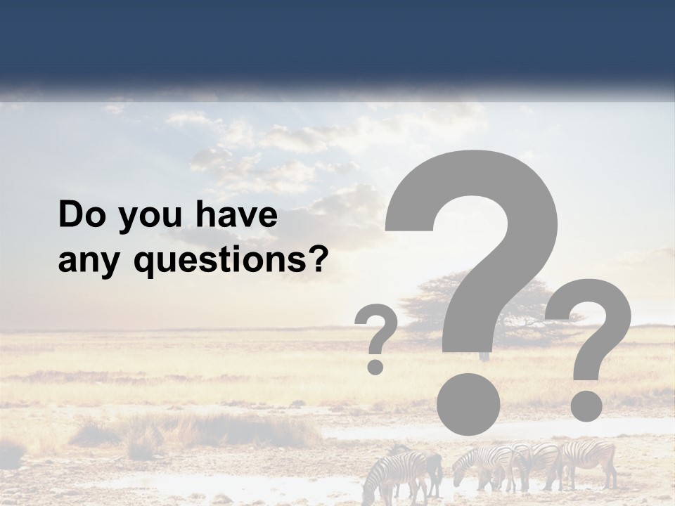 A Group Of Elephants In A Field With A Tree In The Background PowerPoint Template