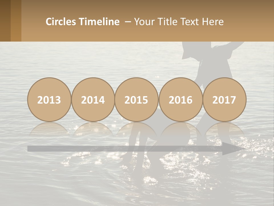 Two Children Playing In A Body Of Water PowerPoint Template