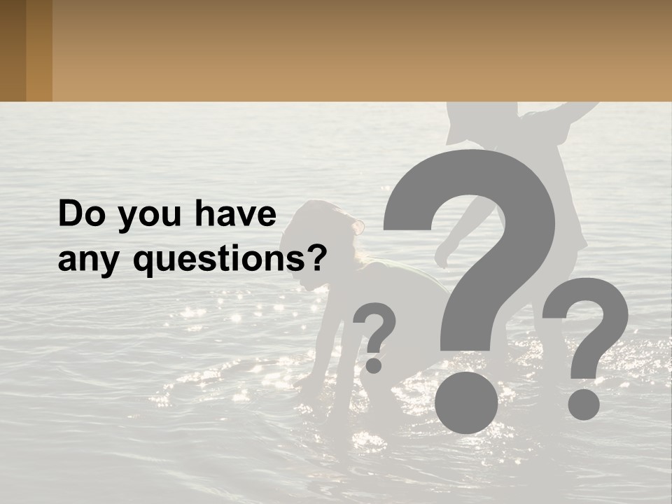 Two Children Playing In A Body Of Water PowerPoint Template