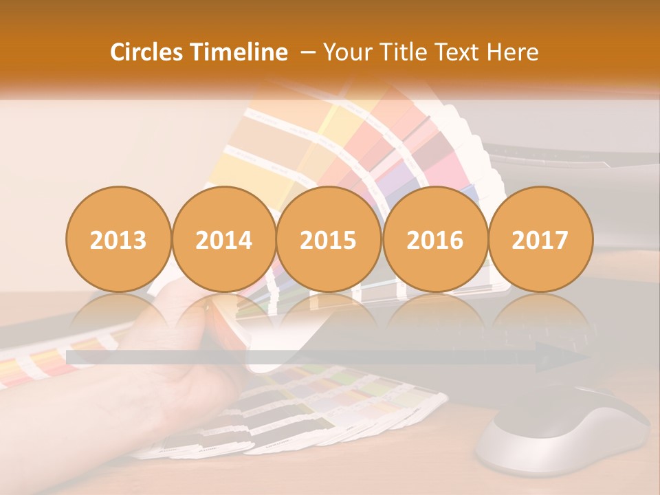 A Person Holding A Color Swater Over A Computer Screen PowerPoint Template