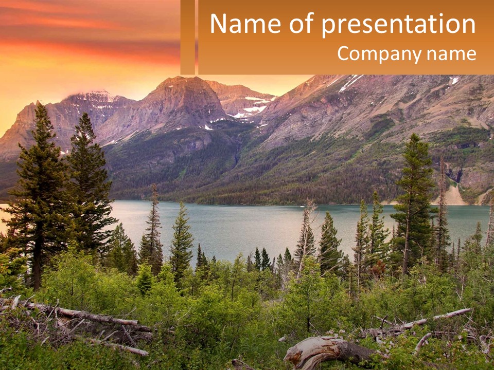 A Mountain Lake Surrounded By Trees And Mountains PowerPoint Template