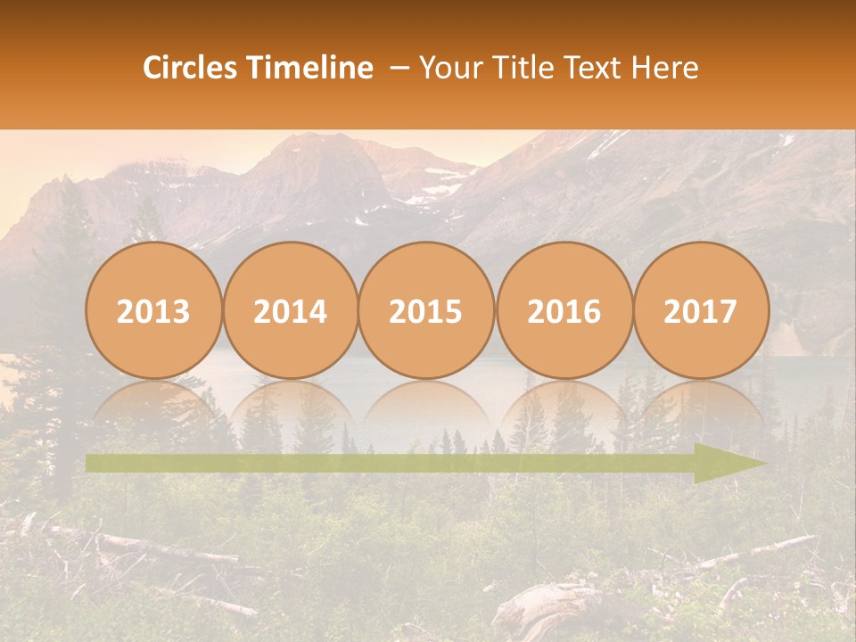 A Mountain Lake Surrounded By Trees And Mountains PowerPoint Template