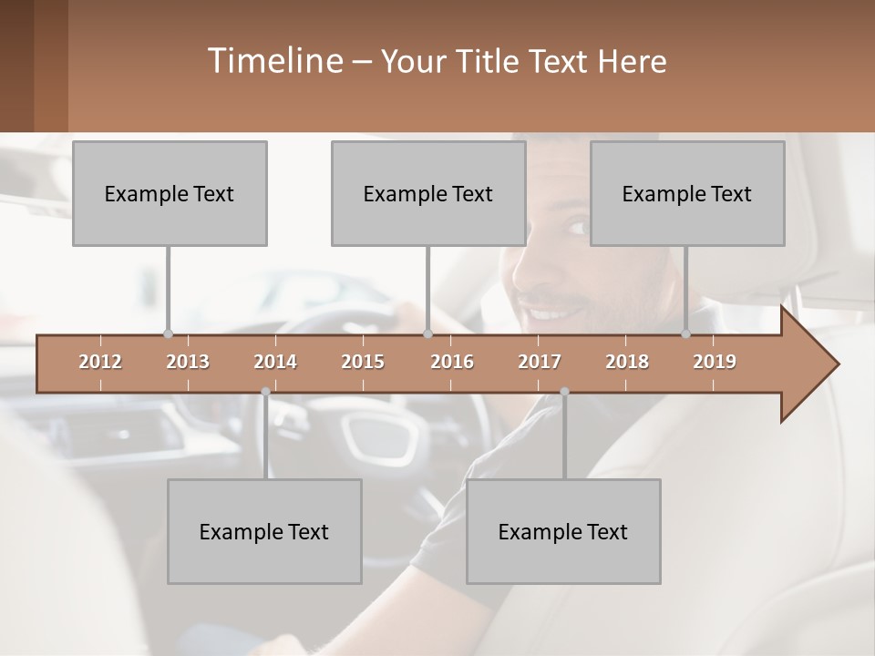 A Man Sitting In A Car With A Steering Wheel PowerPoint Template